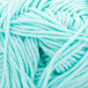 Phil Coton 3 de la compagnie Phildar, coloris Jade. Un bleu-vert pâle, couleur océan turquoise pâle. Fil de coton mercerisé parfait pour les amigurumis, les vêtements d'été et les châles légers. Se tricote avec aiguille ou crochet 3 mm.