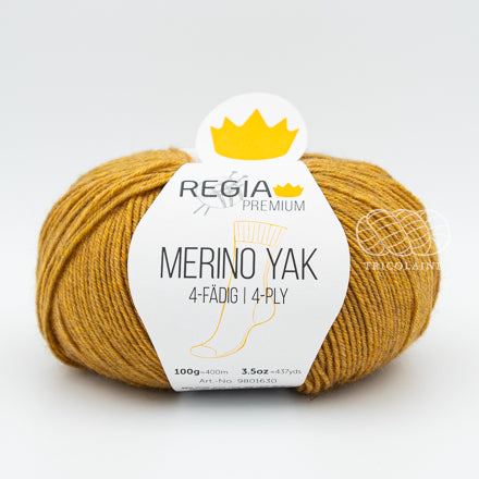 Merino Yak, de Regia Premium, une laine à chaussette qui réalise des bas chauds et doux, faciles à nettoyer.  Le grand classique des amateurs de plein air.  Coloris Himbeer Gold, un jaune or.