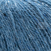 Rowan Felted Tweed, une fibre de calibre DK constituée de laine, alpaga et viscose avec effet tweed.  Coloris Maritime, un bleu denim.